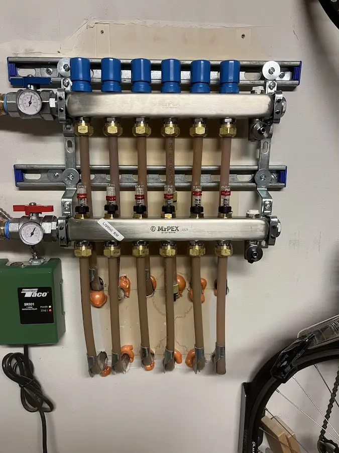 Plumber performing Gas Line Installation at a residential property in Van Buren